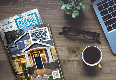 Print Design image of two magazines laying on a desk